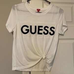 White Guess top with black suede letters